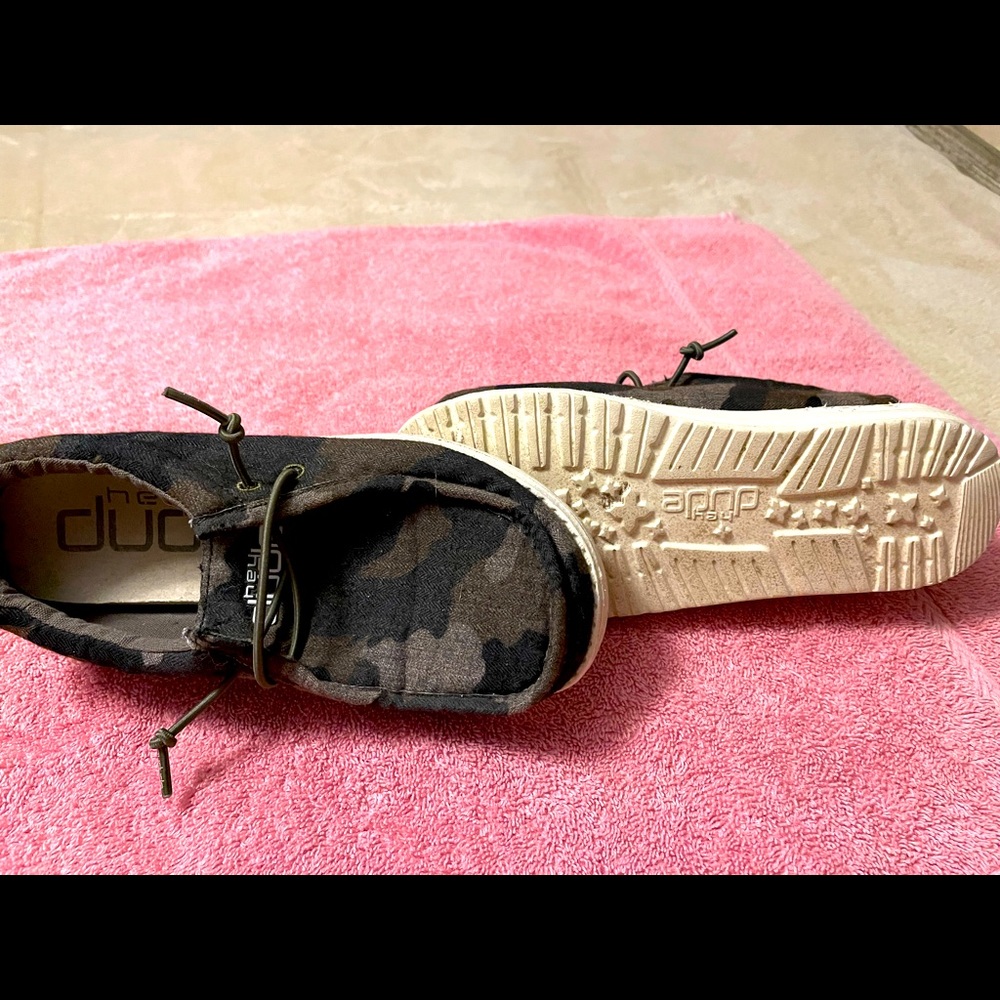 Kids size 1 camo hey dudes. Worn one time for pictures don’t have the box.